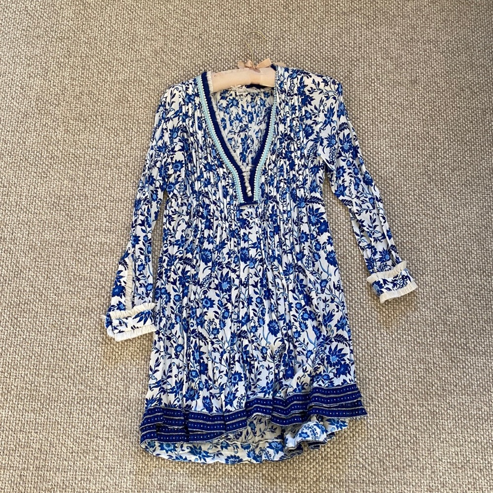 Poupette St. Barth coverup with buttoned sleeves and fringe